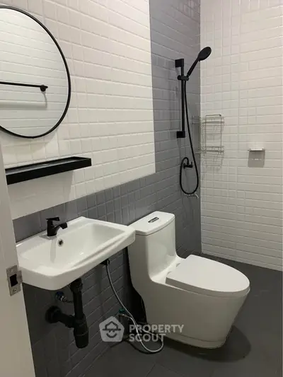 Modern bathroom with sleek fixtures and stylish tile design