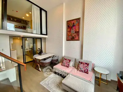 Modern duplex living room with high ceiling and stylish decor