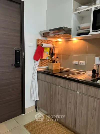 Modern kitchen with wooden cabinets and sleek appliances