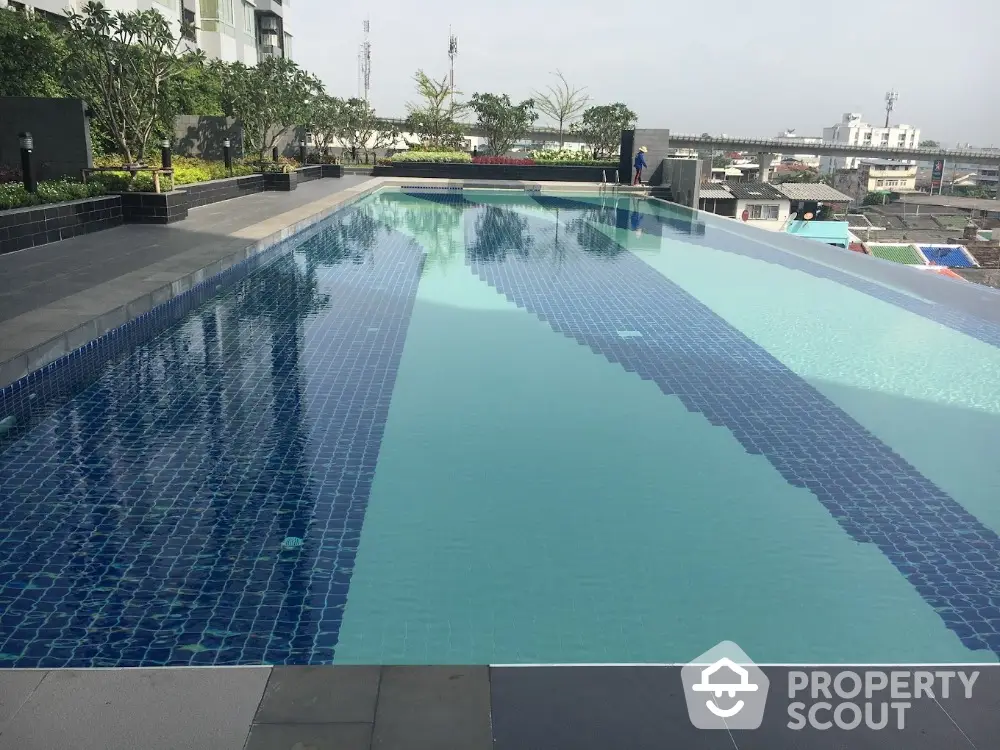 Luxurious rooftop infinity pool with stunning city views and modern design.