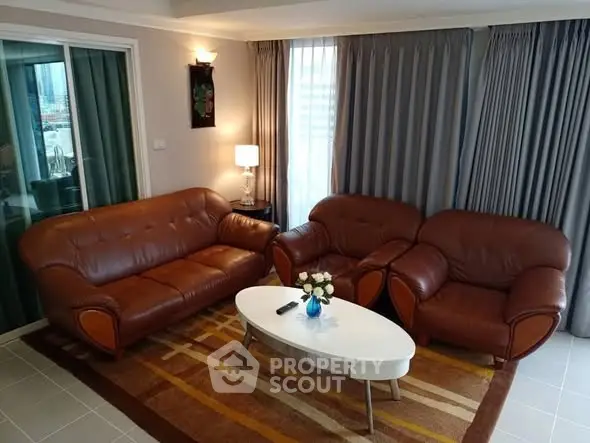 Elegant living room with leather sofas and modern decor