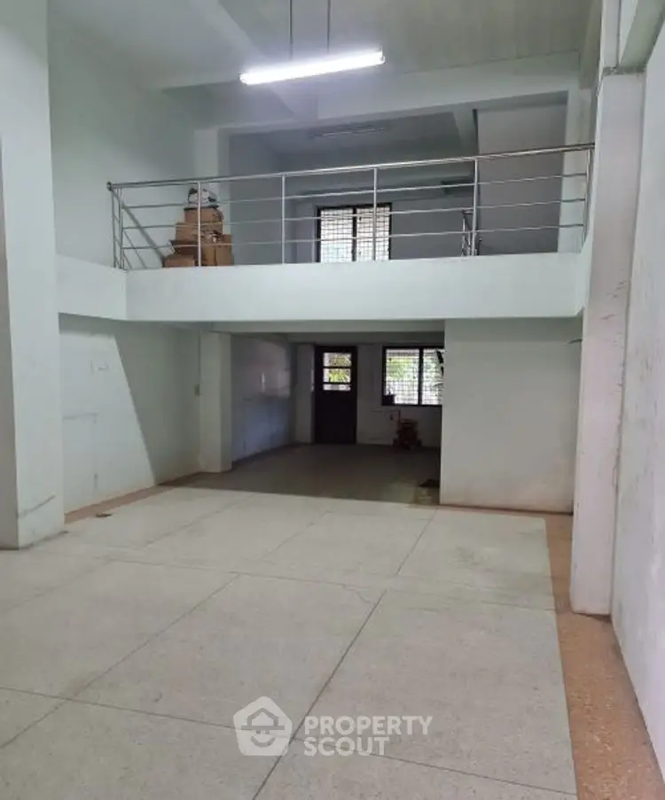 Spacious interior with mezzanine level and natural light