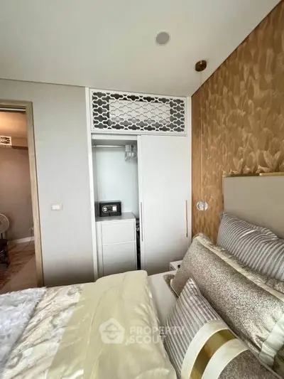 Luxurious bedroom with elegant decor and built-in wardrobe