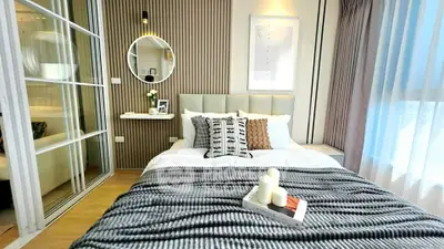 Modern bedroom with stylish decor and cozy ambiance