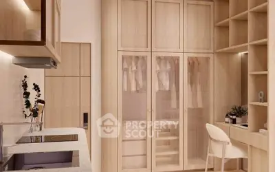 Modern kitchen with integrated study area and sleek wooden cabinetry