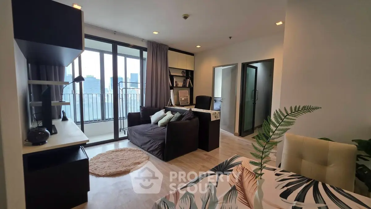 Modern living room with balcony view in stylish apartment
