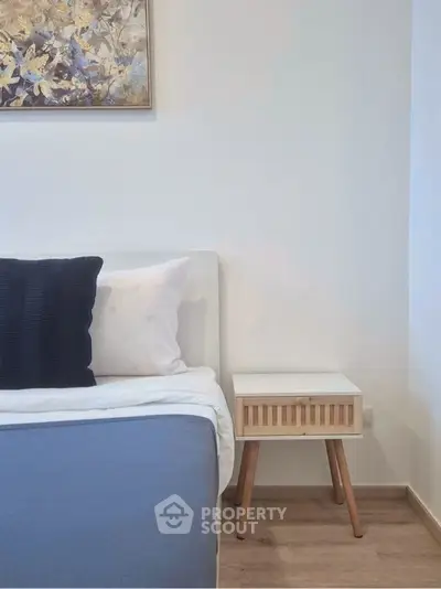 Cozy bedroom with modern decor and stylish nightstand
