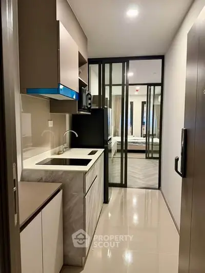 Modern compact kitchen with sleek design and open layout