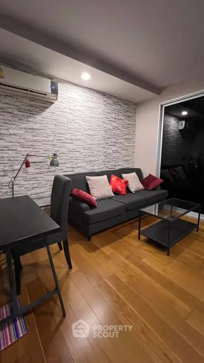 Modern living room with stylish decor and wooden flooring