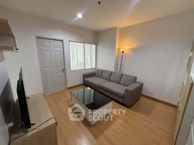 Modern living room with sleek furniture and ambient lighting