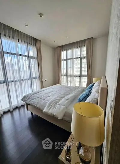 Luxurious bedroom with city view and elegant decor