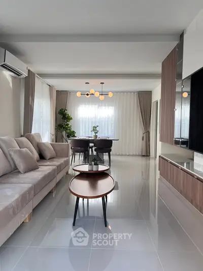 Elegant living room with modern decor and natural light