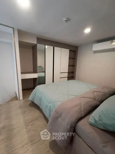 Cozy modern bedroom with stylish wardrobe and soft lighting