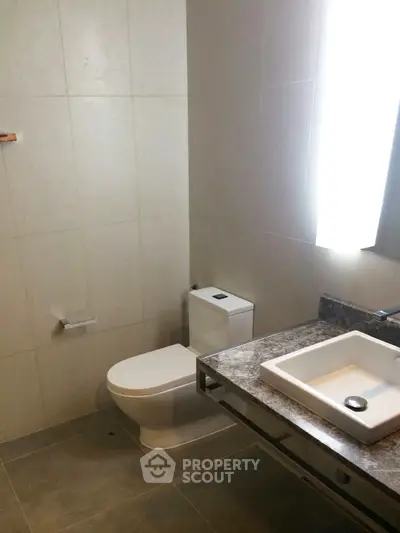 Modern bathroom with sleek fixtures and minimalist design