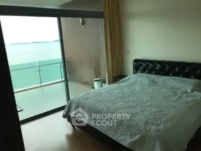 Luxurious bedroom with ocean view and spacious balcony access