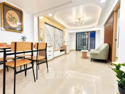 Spacious modern living room with elegant decor and city view, perfect for urban living.