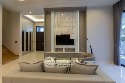 Luxurious living room with modern decor and elegant lighting