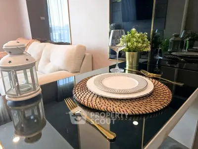 Elegant dining setup in modern living room with cozy sofa and stylish decor