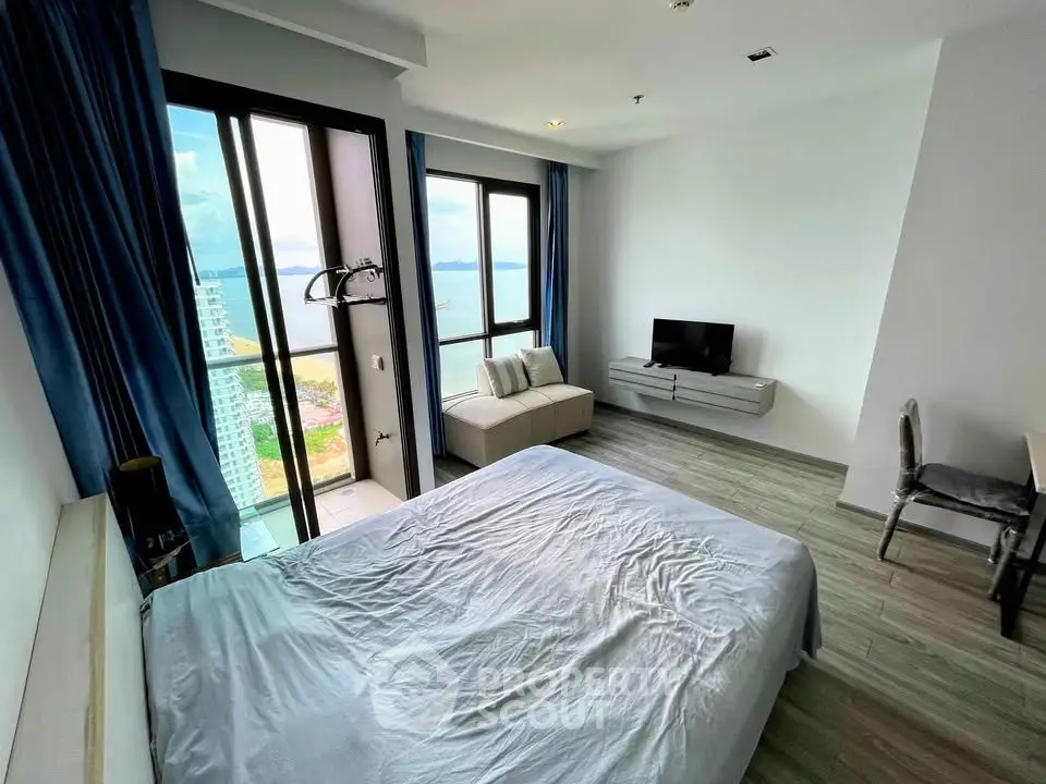 Modern bedroom with stunning ocean view and stylish decor