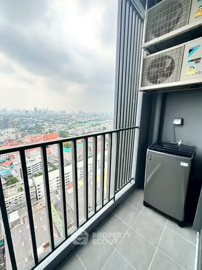 High-rise balcony with city view and air conditioning units, perfect for urban living.