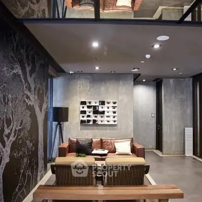 Modern living room with stylish decor and comfortable seating in a contemporary apartment.