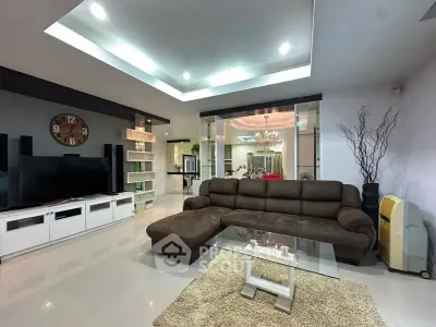 Spacious modern living room with stylish decor and cozy seating area