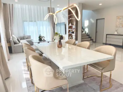 Luxurious modern dining room with elegant lighting and stylish decor