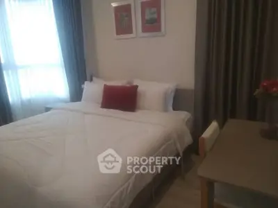 Cozy bedroom with elegant decor and natural light