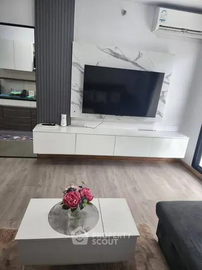 Modern living room with sleek TV setup and stylish decor