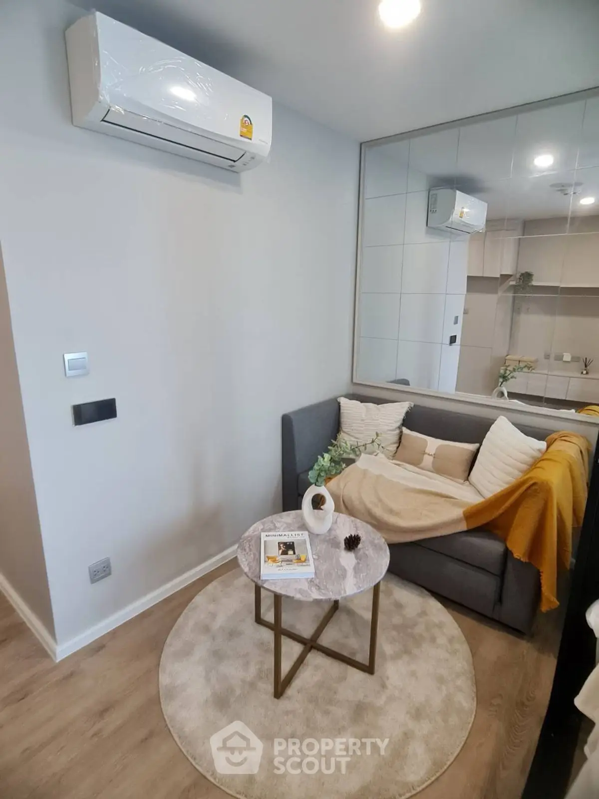 Cozy modern living room with air conditioning and stylish decor