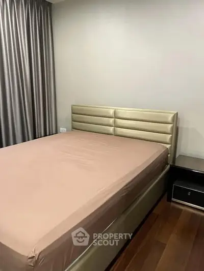 Modern bedroom with sleek design and luxurious bed frame