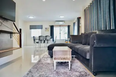 Spacious living room with modern furniture and natural light