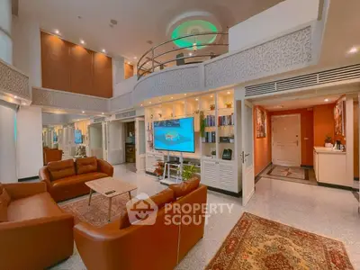 Luxurious living room with high ceilings, elegant decor, and modern furnishings in a spacious open layout.