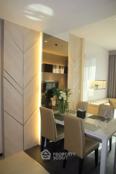 Modern dining area with elegant decor and natural lighting