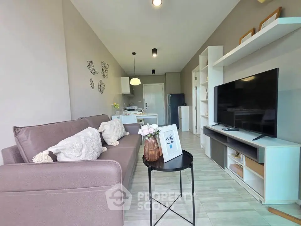 Modern living room with stylish decor and open kitchen layout