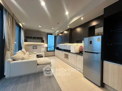 Modern open-layout kitchen and living room with sleek design and city view.