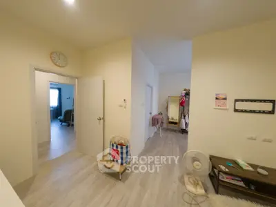 Spacious interior with modern decor and open layout, featuring a cozy living area and stylish furnishings.