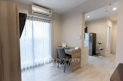 Modern apartment interior with sleek furniture and natural light