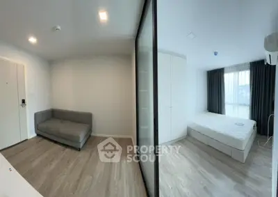 Modern apartment interior with cozy living area and bright bedroom