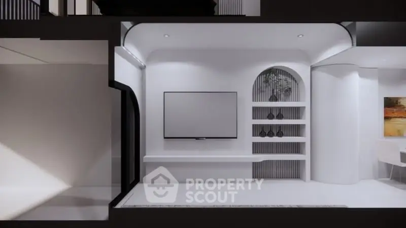 Modern living room with sleek white design and built-in TV unit