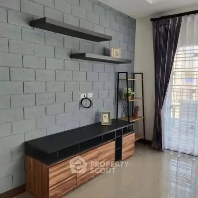 Modern living room with stylish shelving and natural light