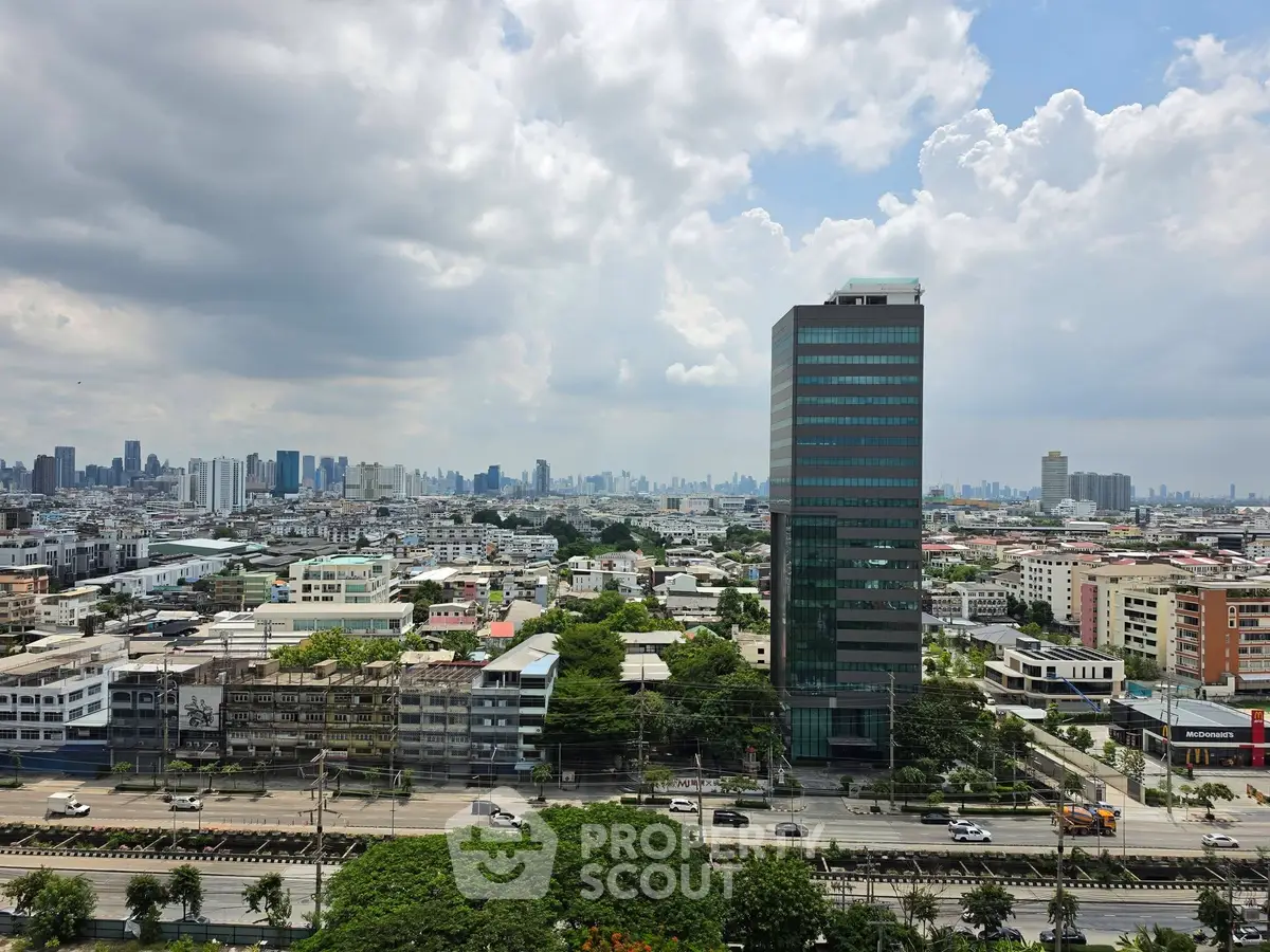 Stunning cityscape view with modern high-rise building and expansive skyline, perfect for urban living enthusiasts.