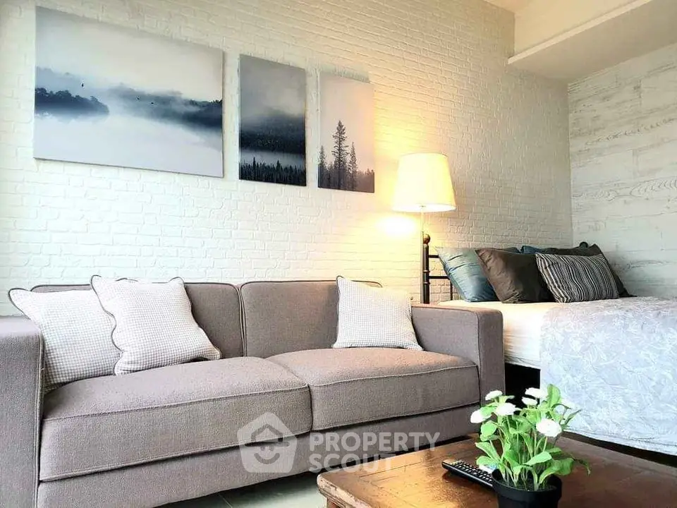 Chic modern living room with cozy sofa and stylish decor