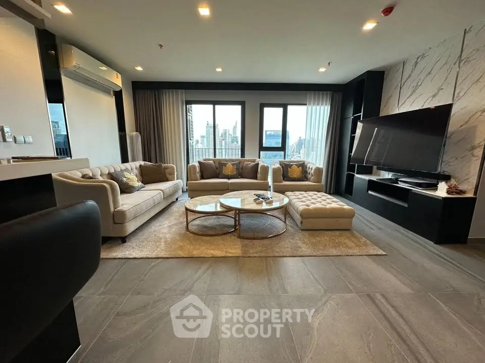 Luxurious modern living room with elegant decor and stunning city view.