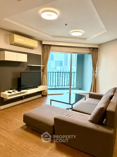 Modern living room with city view and stylish furniture