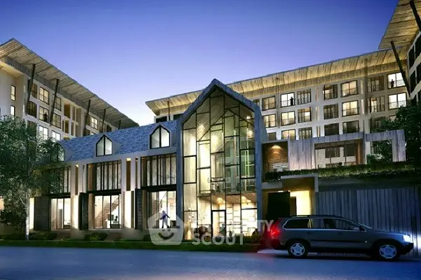 Stunning modern apartment building with unique architectural design and large glass windows.