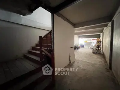 Spacious unfinished interior with potential for customization and modern design.