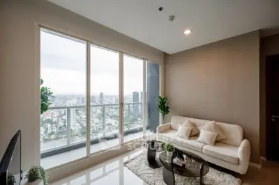 Modern living room with stunning city view and elegant decor