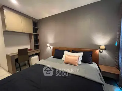 Cozy modern bedroom with stylish decor and built-in storage, perfect for relaxation and comfort.