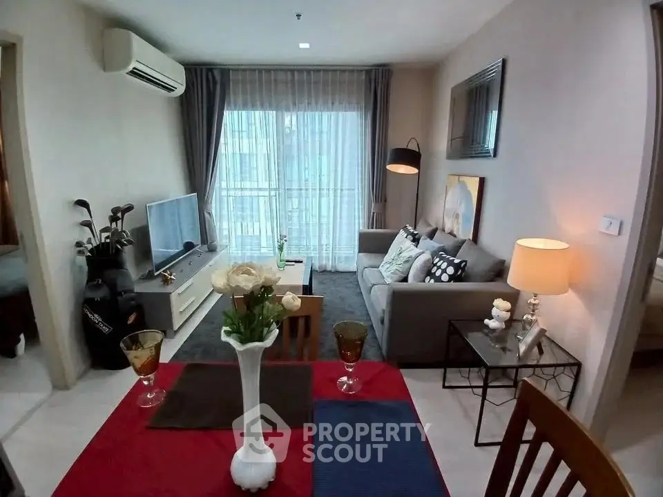 Charming living room with modern decor and natural light, perfect for cozy gatherings.